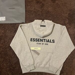 Dark oat Essential hoodies